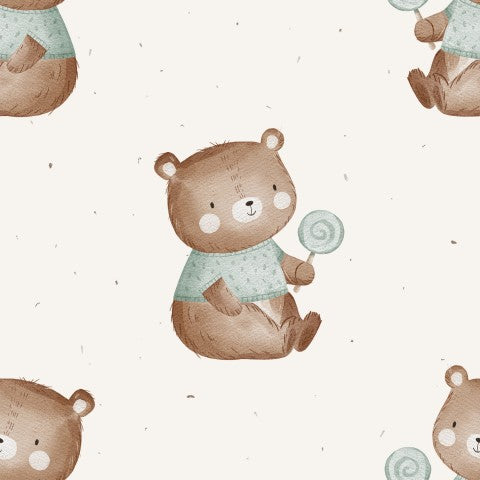 Musselin einem braunen Teddybären, der einen Lutscher hält