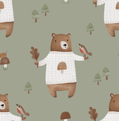 Ours bruns en tissu imperméable portant des pulls