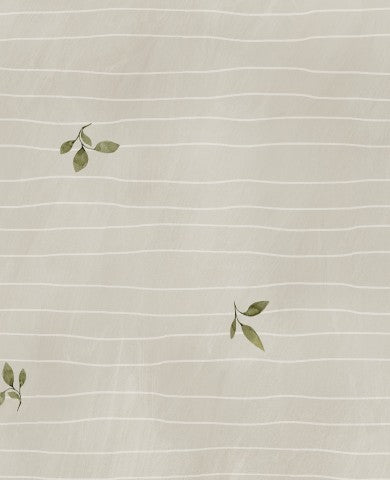 French Terry a patterned fabric with leaves on it