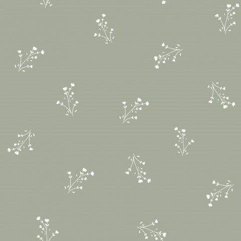 Waterproof fabric a green background with white flowers on it