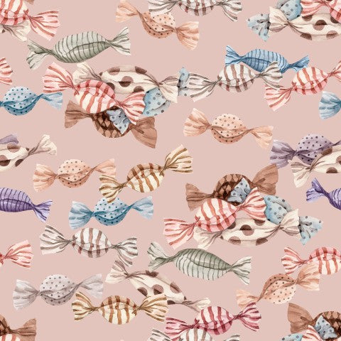 Motivo di mussola con dolci su sfondo rosa