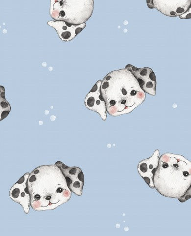 Søde dalmatiske hunde i satinbomuld på blå baggrund