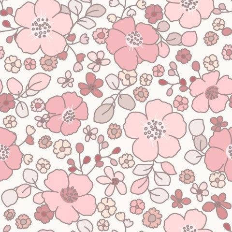 Flores rosas de algodón satinado sobre fondo blanco.