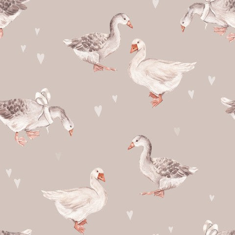French Terry a pattern of ducks and hearts on a beige background