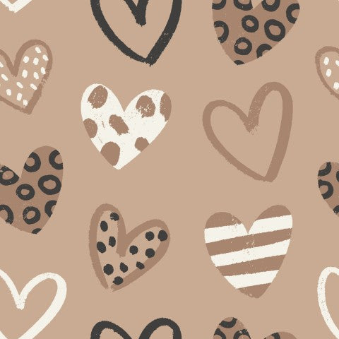 Muslin hearts on beige background