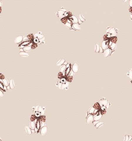 Muslin teddy bears on beige background