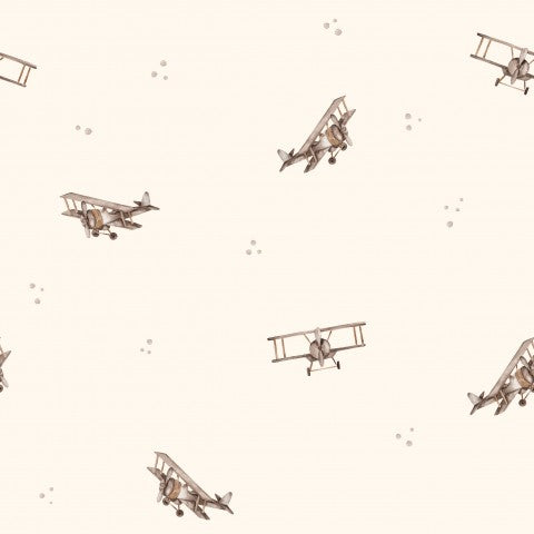 French Terry Muster von Flugzeugen auf einem beigen Hintergrund