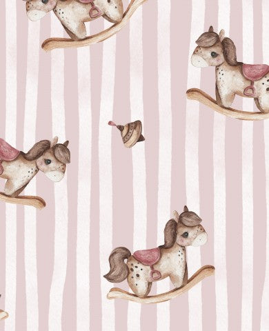 Muslin rocking horses on a pink striped background