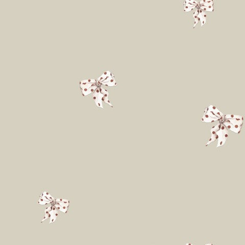 Muslin bows on a grey/green background