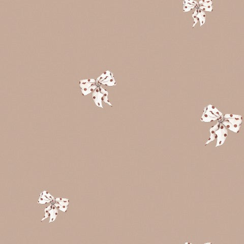 Satin cotton a brown background with bows on it