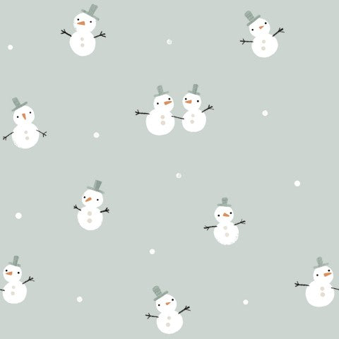 Rib Jersey a pattern of snowmen on a green background