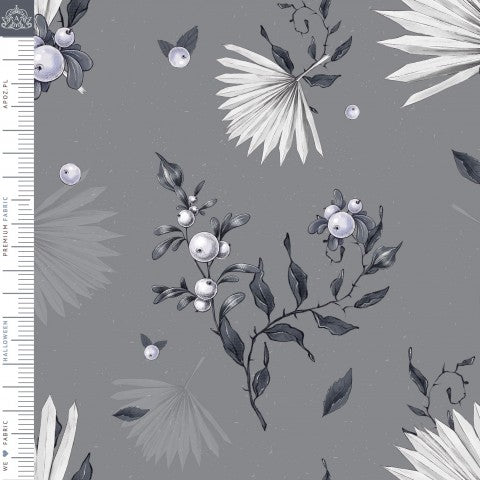 Muslin ett grått tyg med vita blommor och blad