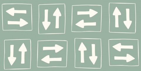 Jersey flere pile peger i forskellige retninger på en grøn baggrund