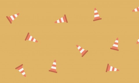 Waterproof fabric a pattern of traffic cones on a yellow background