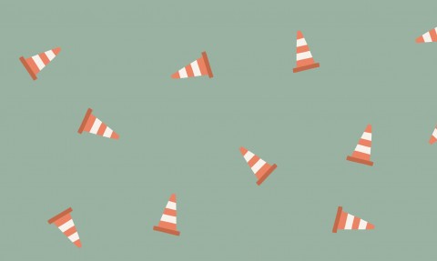 SoftShell a pattern of traffic cones on a green background