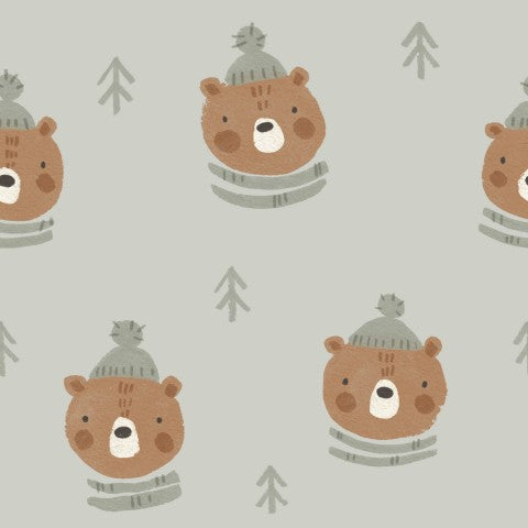 Panama pattern of cute bears with hats on a green background