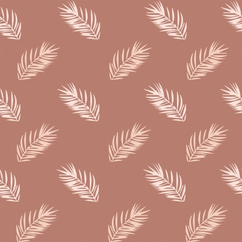 Feuilles de palmier en satin de coton sur fond rose